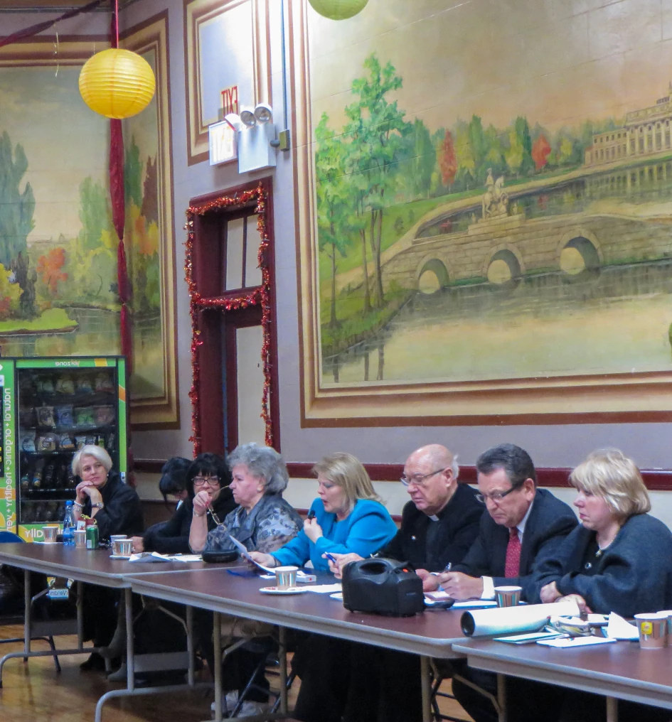 Board members gathered during a formal meeting